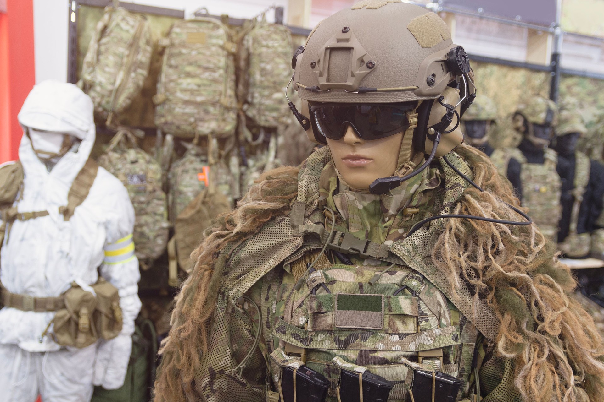 Mannequin in army helmet and camouflage gear