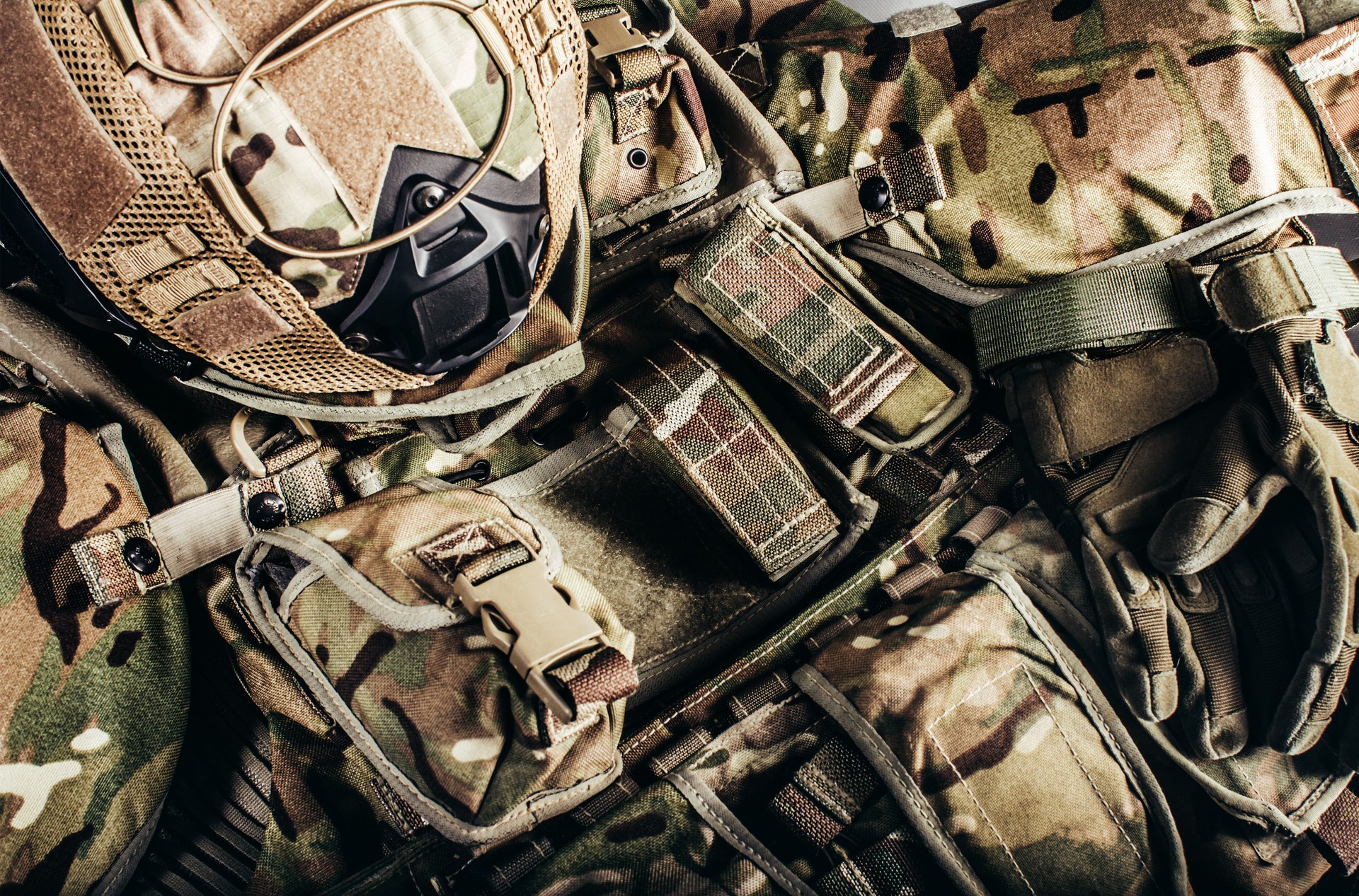 Level 3 protection soldier ammunition and helmet laying on table.